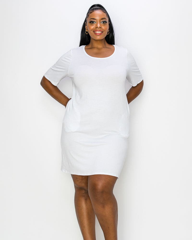 Front of a model wearing a size 1X Emily Pocket T-Shirt Dress in White by L I V D. | dia_product_style_image_id:241333